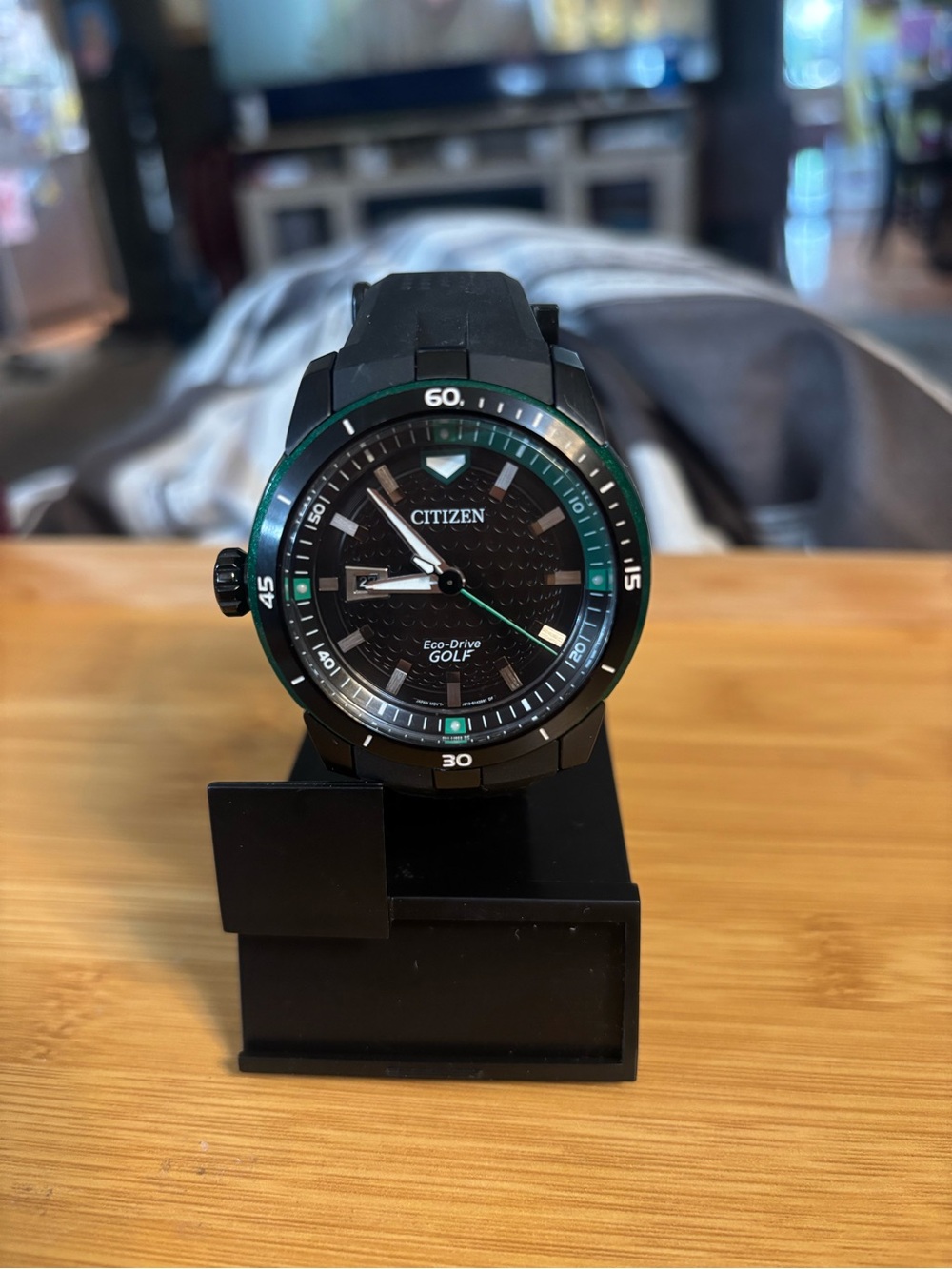 Citizen Men's Black Watch with Green Accent Bezel